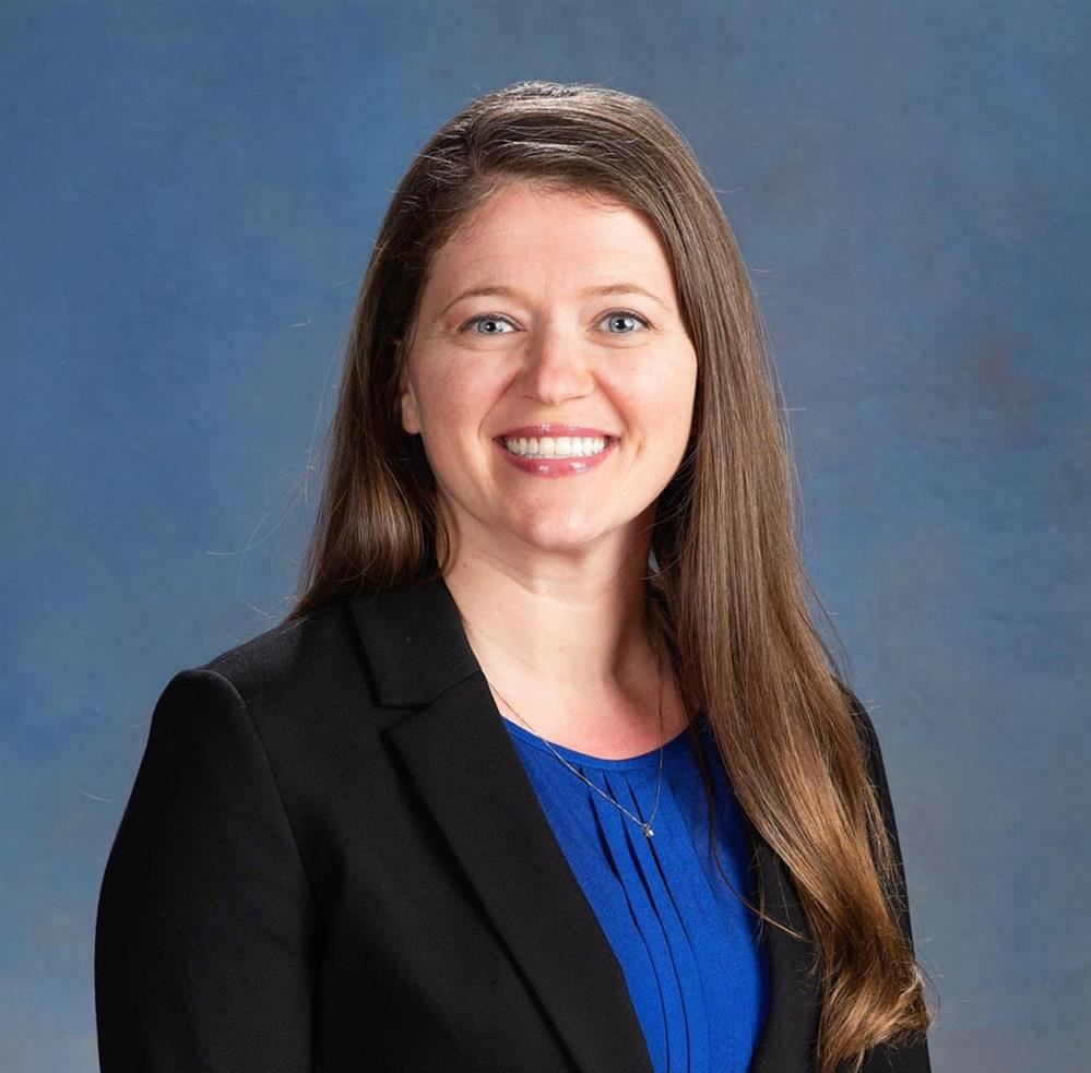 Dr. Justina White